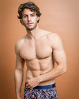 Eco-friendly boxer briefs featuring a Protea pattern on a navy base
